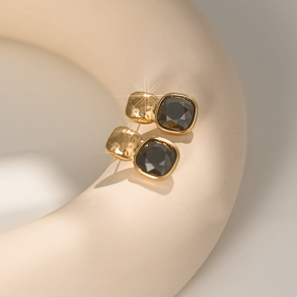 Goudkleurige oorknopjes met vierkante turquoise steen