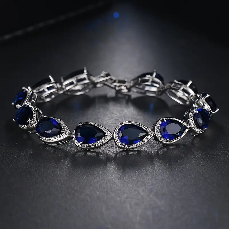 Schakelarmband met blauwe druppelsteen