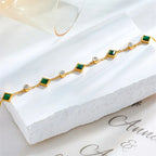 Gold-Tone Chain Bracelet with Green Stone Stations