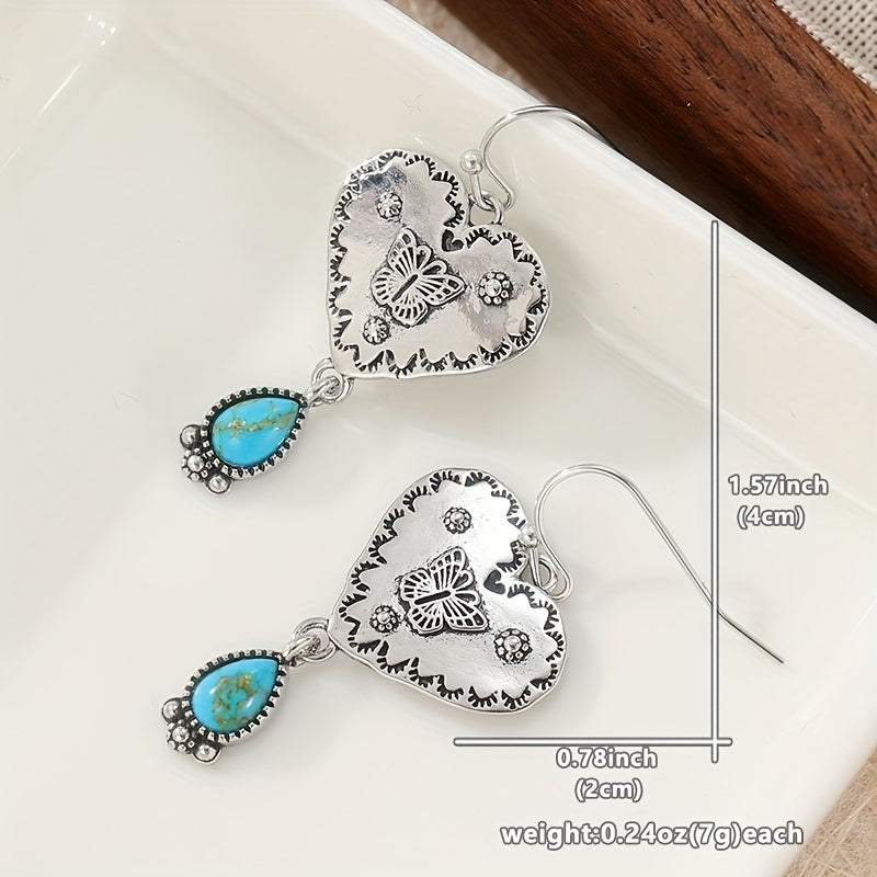 Ambachtelijke boho oorbellen met turquoise hart en vlinder