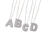 Ketting met bubbelletter-initiaal in twee metaalkleuren