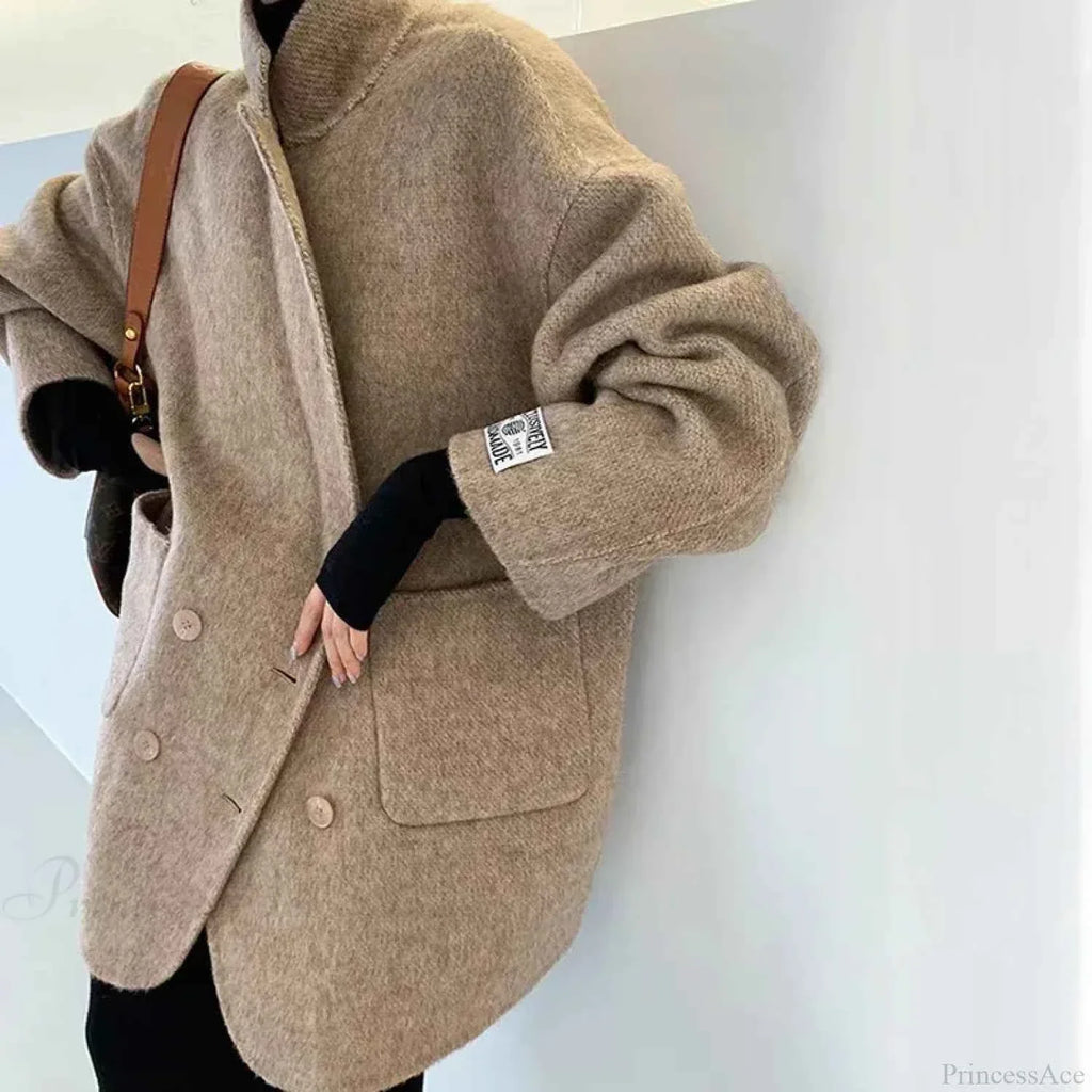 Single Breasted V Neck Longline Coat with a Wide Waist Cut