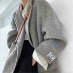 Single Breasted V Neck Longline Coat with a Wide Waist Cut