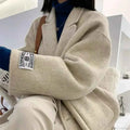 Single Breasted V Neck Longline Coat with a Wide Waist Cut