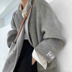 Single Breasted V Neck Longline Coat with a Wide Waist Cut
