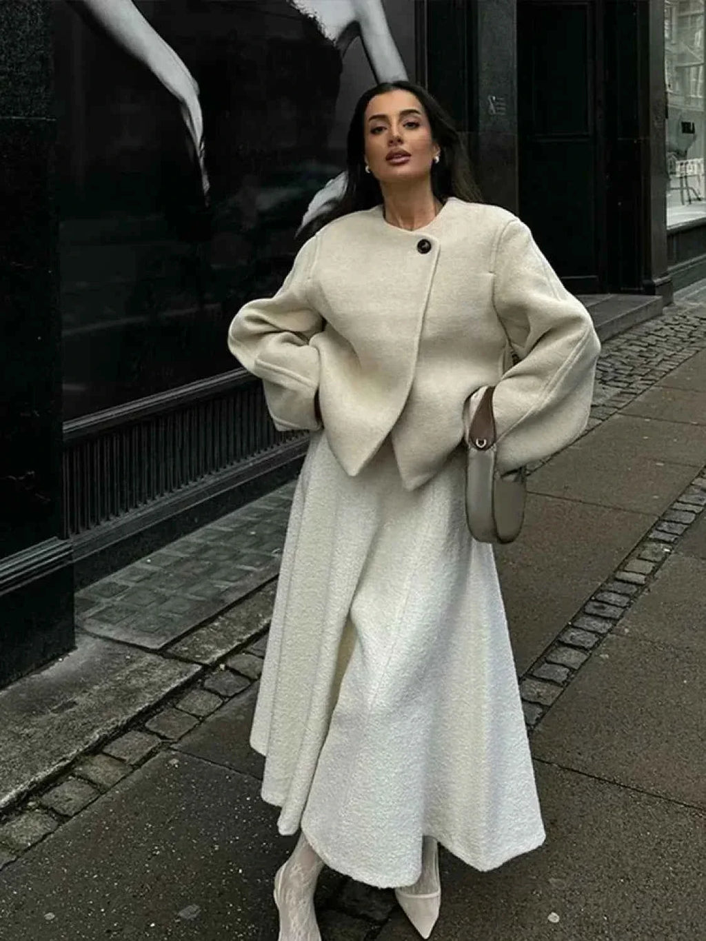 Short Soft Knit Coat with a Round Collar and a Loose Fit