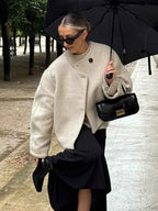 Short Soft Knit Coat with a Round Collar and a Loose Fit