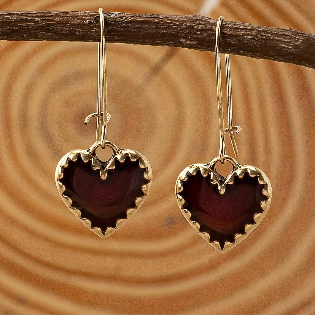 Vintage bohemian hartoorbellen met rode druppelhars