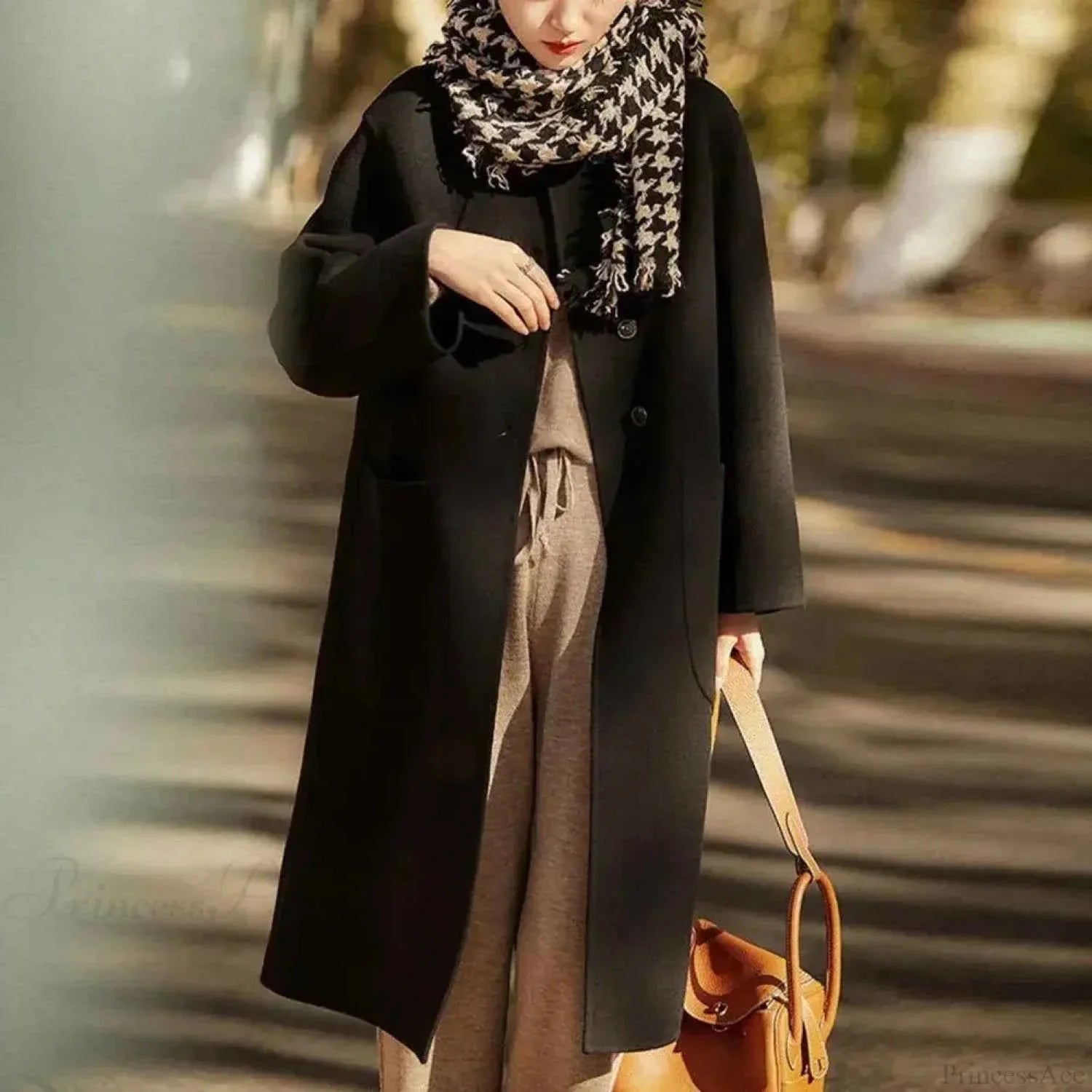 Single-Breasted Longline Coat with a Turn-Down Lapel Collar
