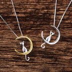 Ketting met halve maan en kat