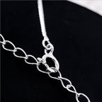 Ketting met halve maan en kat