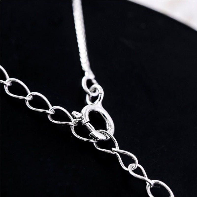 Ketting met halve maan en kat