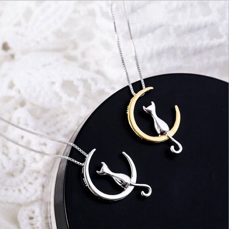 Ketting met halve maan en kat