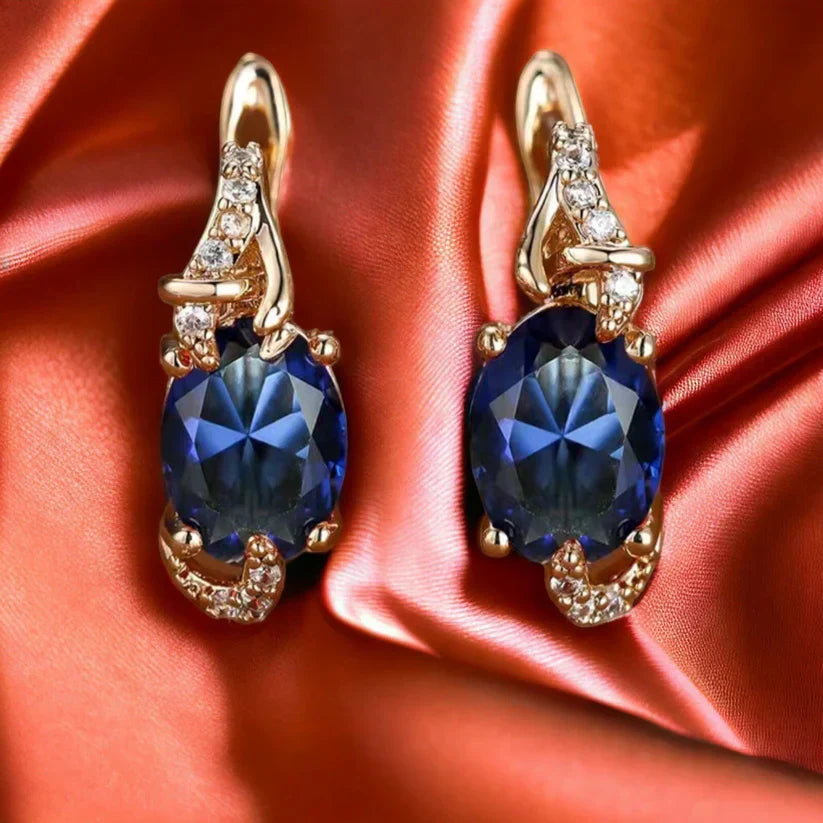 Midnight-Blue Oval Stone Leverback Earrings in Gold Tone