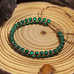 Malachite-Pattern Green Bead Bracelet with Gold-Tone Weave