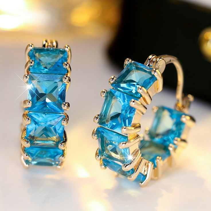 Oorringen met blauw kristal in vintagestijl