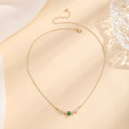 Gold-Tone Necklace with Green Leaf Accent