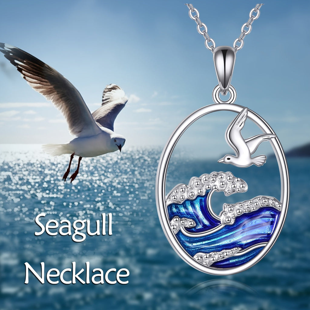 Zilverkleurige ketting met hanger met oceaangolf en meeuw