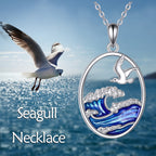 Zilverkleurige ketting met hanger met oceaangolf en meeuw