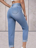 Highwaist jeans met omgeslagen zoom en zakken voor en achter