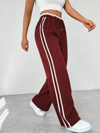 Katoenen joggingbroek met wijde pijpen, zijstrepen en koord