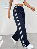Katoenen joggingbroek met wijde pijpen, zijstrepen en koord