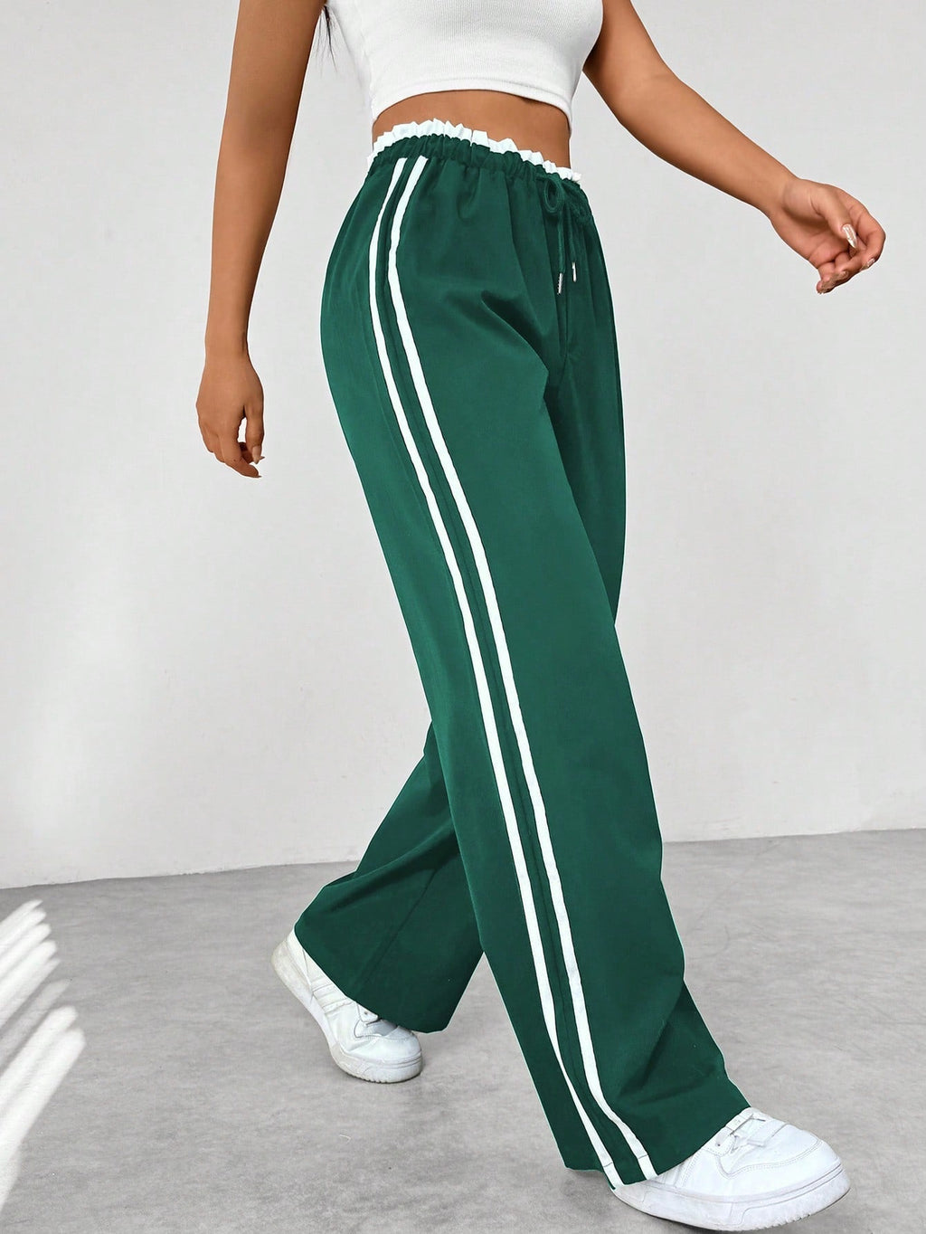 Katoenen joggingbroek met wijde pijpen, zijstrepen en koord