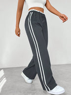Katoenen joggingbroek met wijde pijpen, zijstrepen en koord