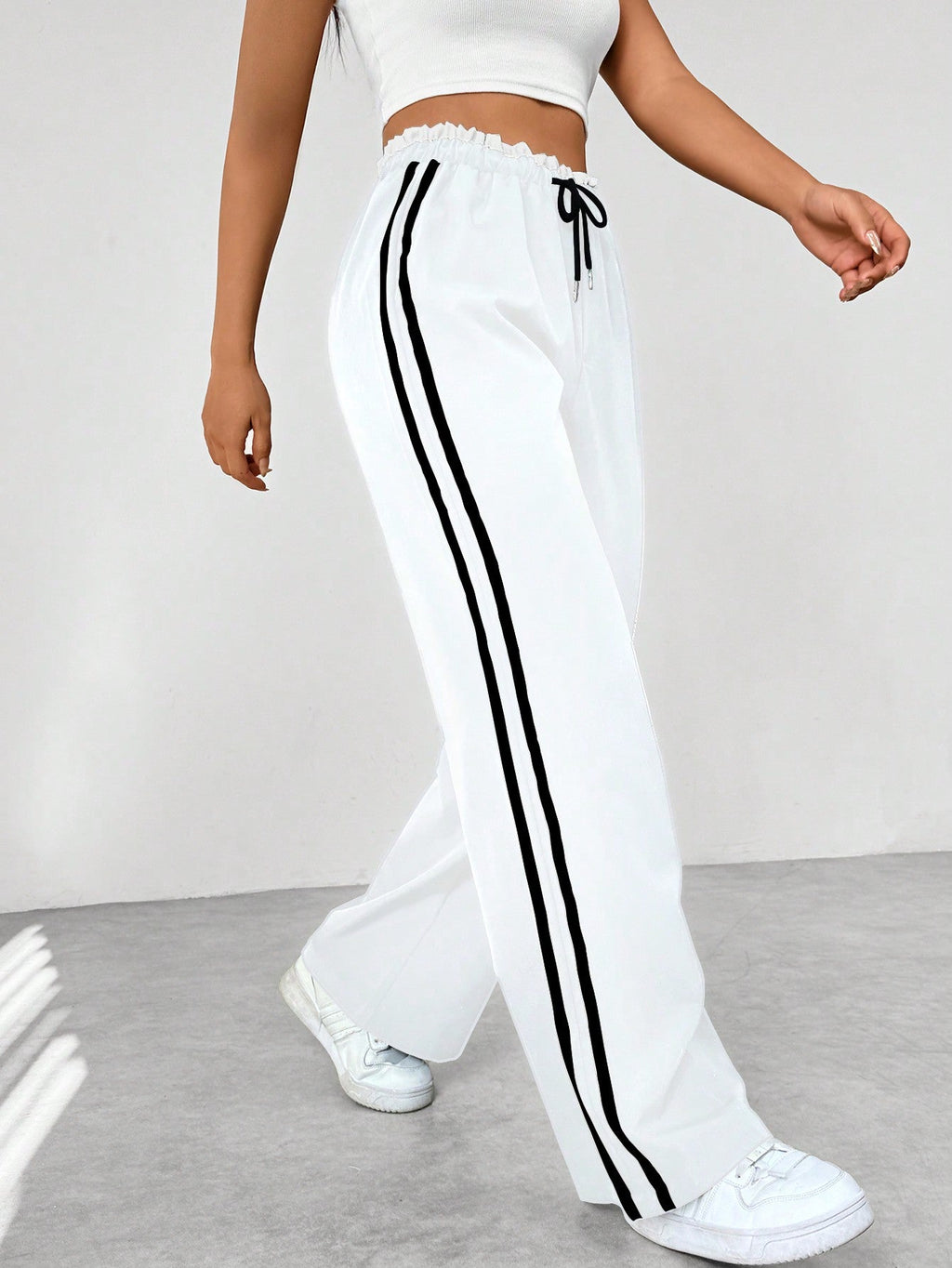 Katoenen joggingbroek met wijde pijpen, zijstrepen en koord