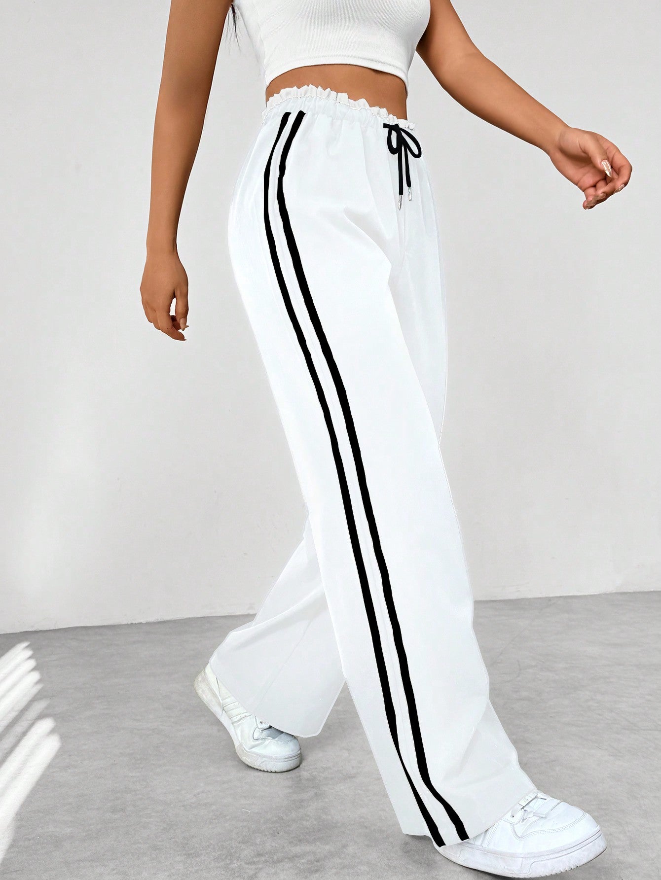 Katoenen joggingbroek met wijde pijpen, zijstrepen en koord