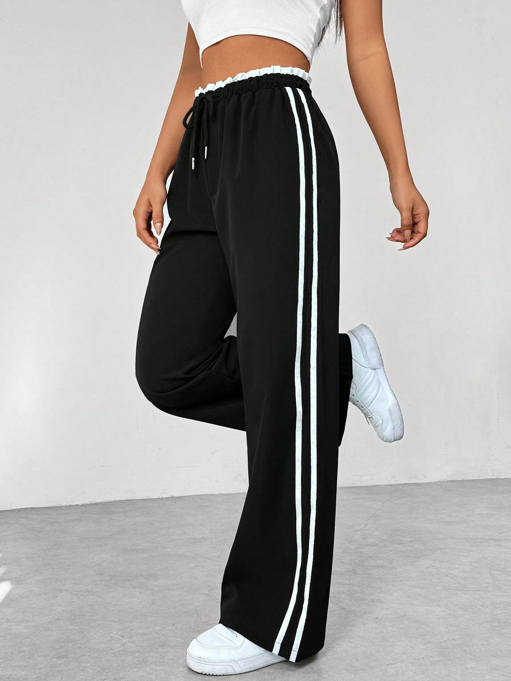 Katoenen joggingbroek met wijde pijpen, zijstrepen en koord