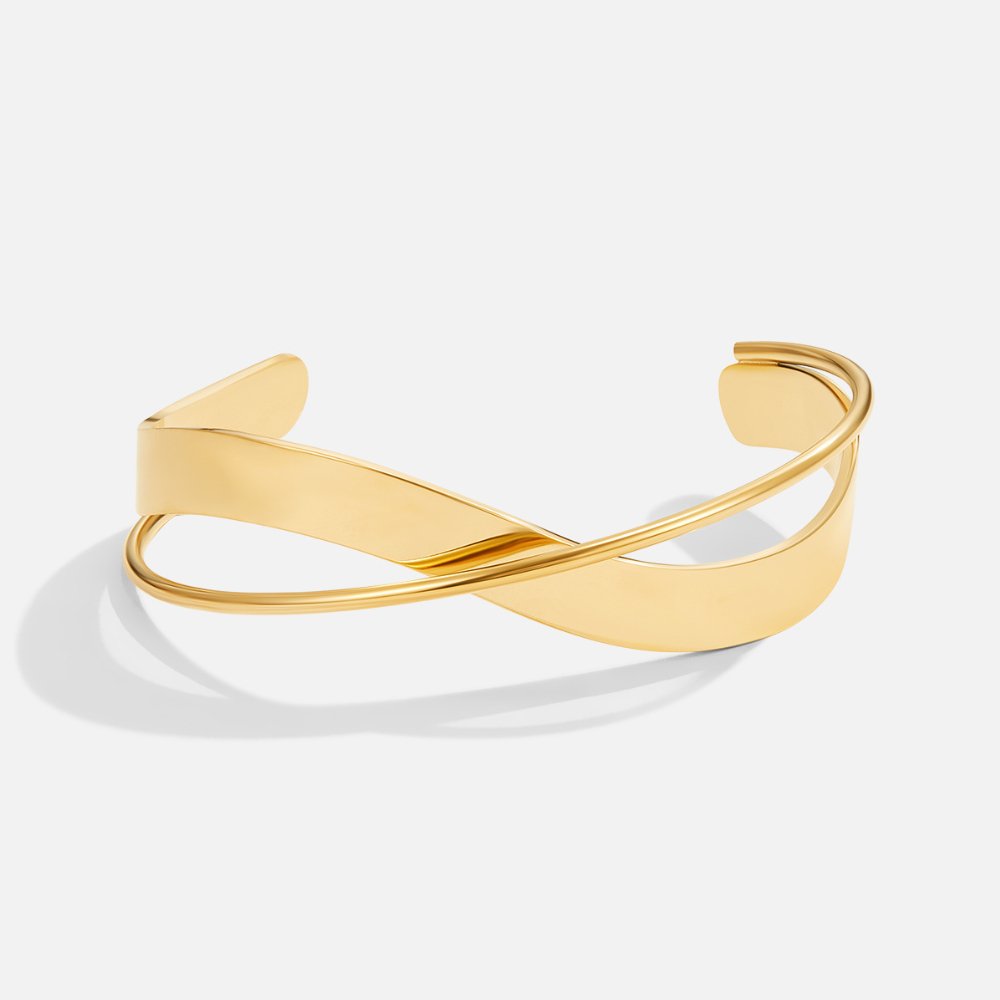 Goudkleurige gedraaide golfbangle