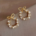Minimalist Butterfly Knot Pearl Earrings