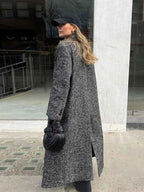 Faux Fur Coat with Patchwork Panels and a Tie Fastening