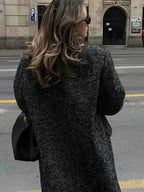 Faux Fur Coat with Patchwork Panels and a Tie Fastening