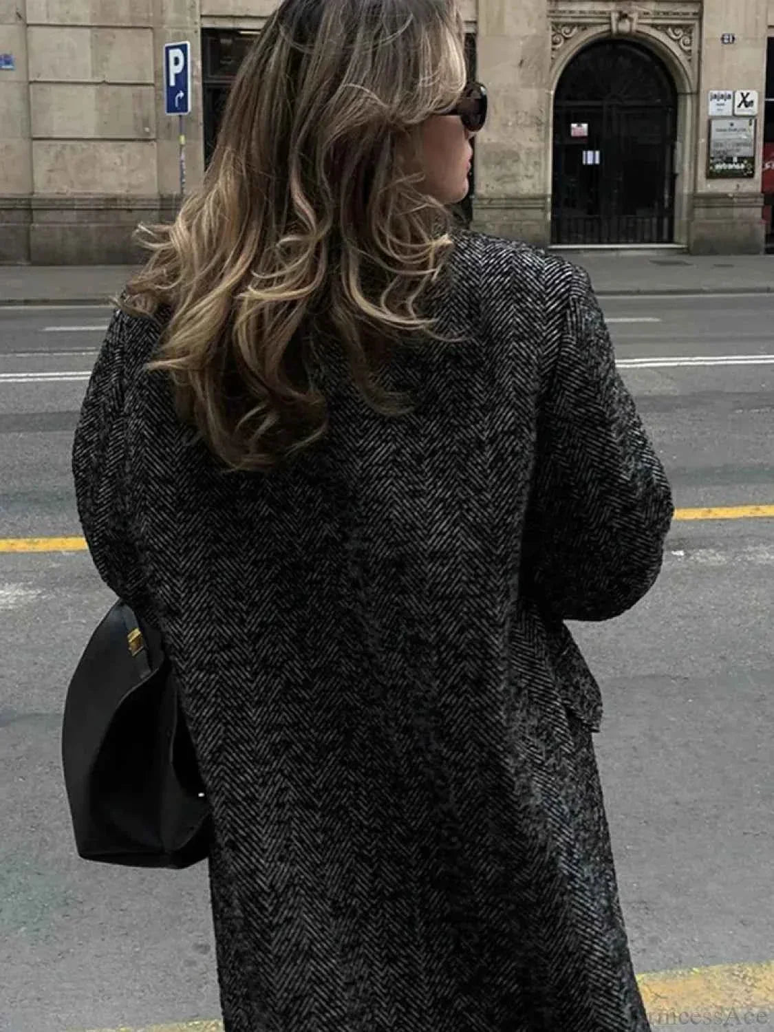 Faux Fur Coat with Patchwork Panels and a Tie Fastening