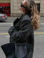 Faux Fur Coat with Patchwork Panels and a Tie Fastening