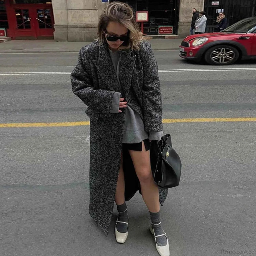 Faux Fur Coat with Patchwork Panels and a Tie Fastening