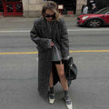 Faux Fur Coat with Patchwork Panels and a Tie Fastening