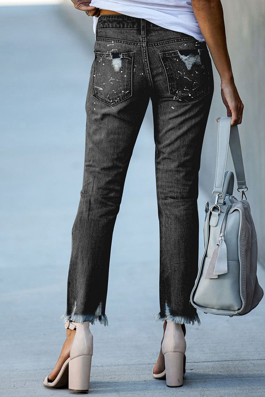 Ripped jeans met knoopsluiting en zakken voor