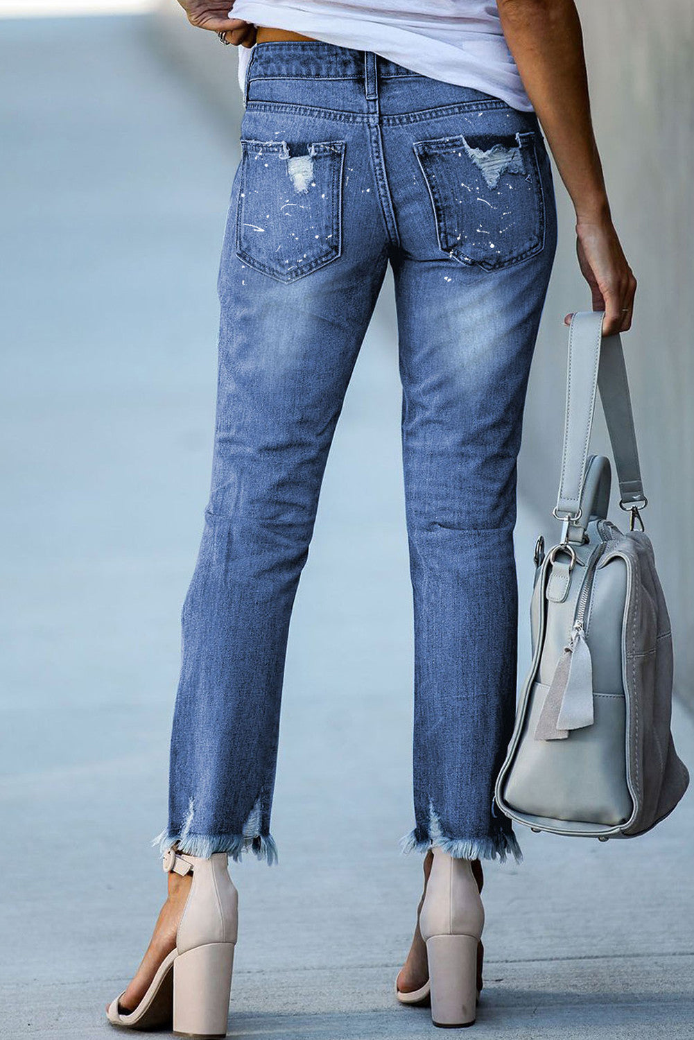 Ripped jeans met knoopsluiting en zakken voor