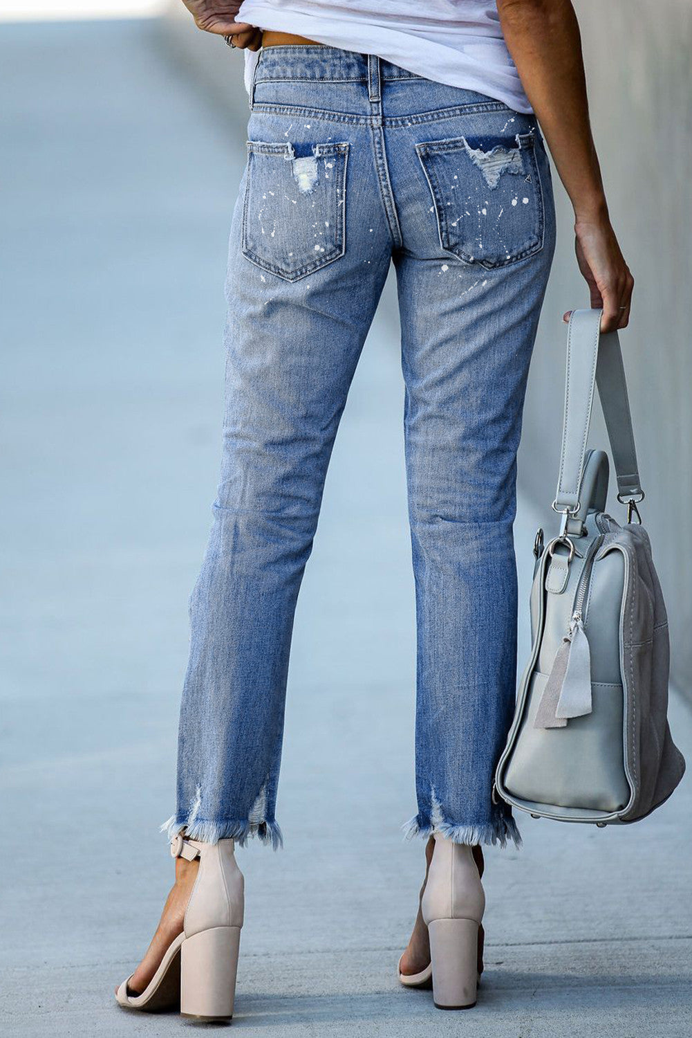Ripped jeans met knoopsluiting en zakken voor