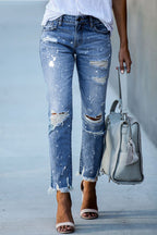 Ripped jeans met knoopsluiting en zakken voor