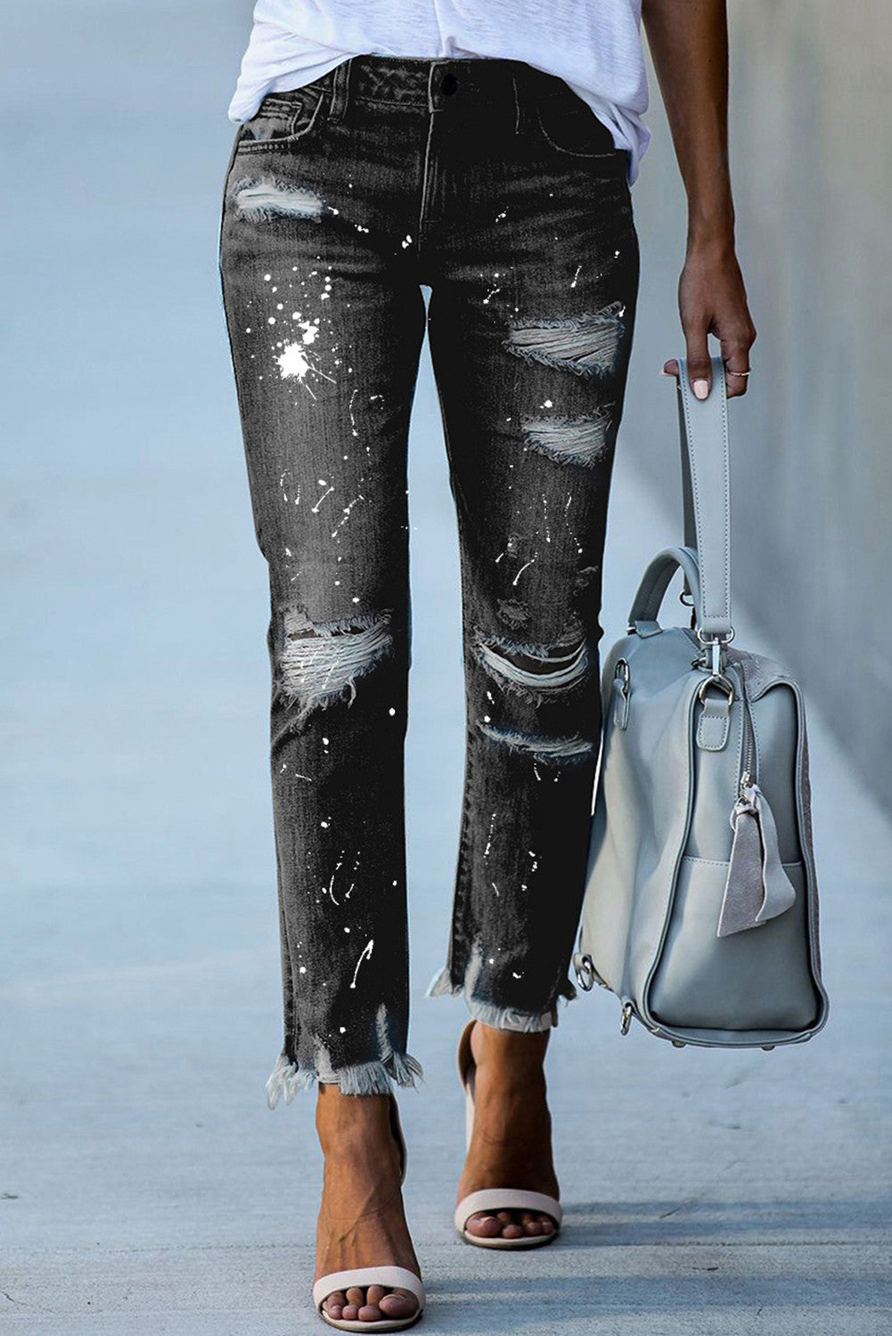 Ripped jeans met knoopsluiting en zakken voor