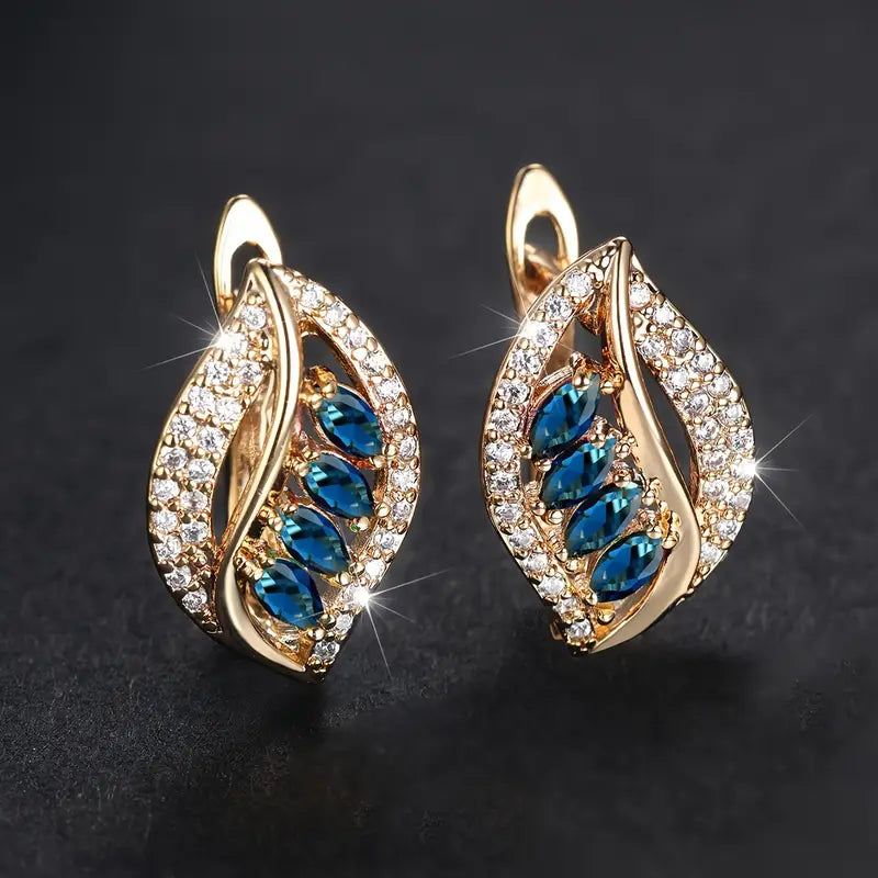 Statement-bladoorbellen met blauwe steen in goudkleur
