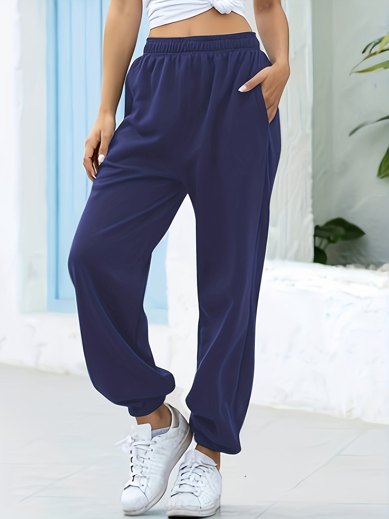 Joggingbroek met hoge taille, rechte pijp en zijzakken