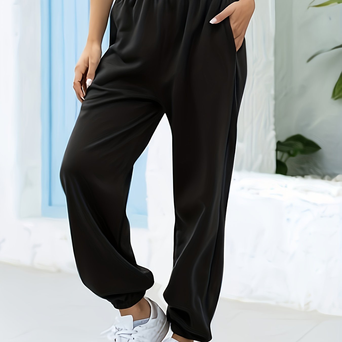 Joggingbroek met hoge taille, rechte pijp en zijzakken
