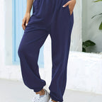 Joggingbroek met hoge taille, rechte pijp en zijzakken
