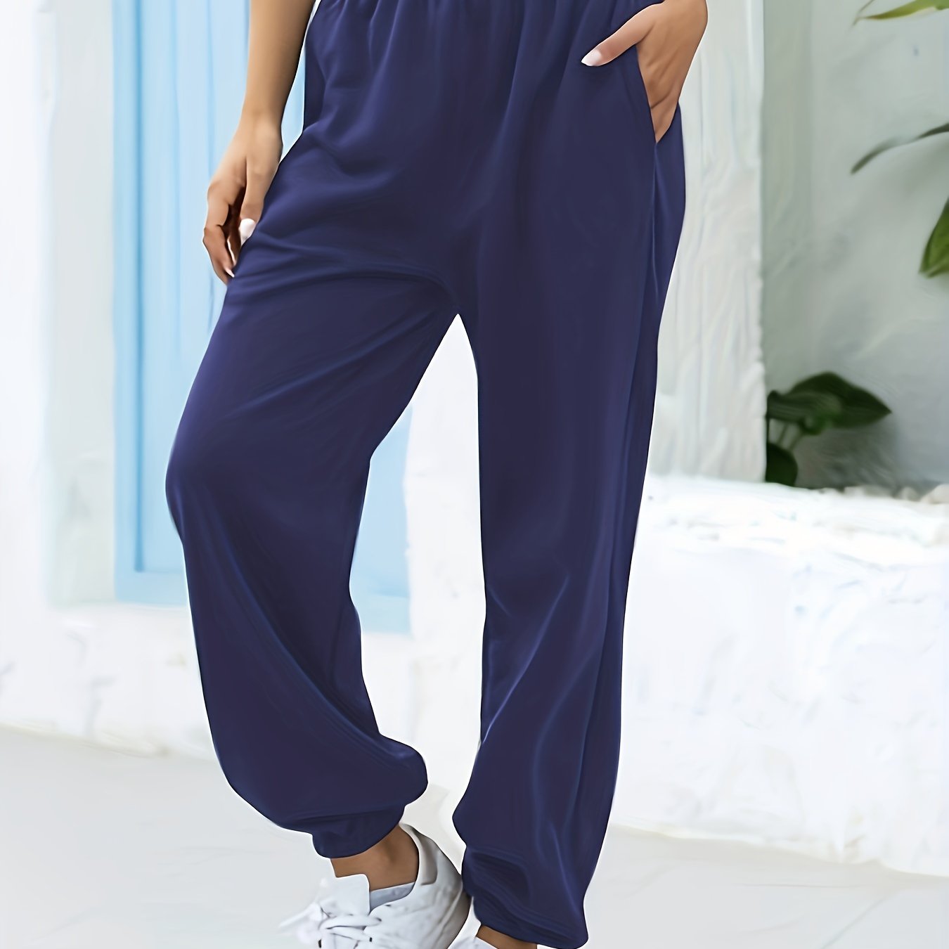 Joggingbroek met hoge taille, rechte pijp en zijzakken
