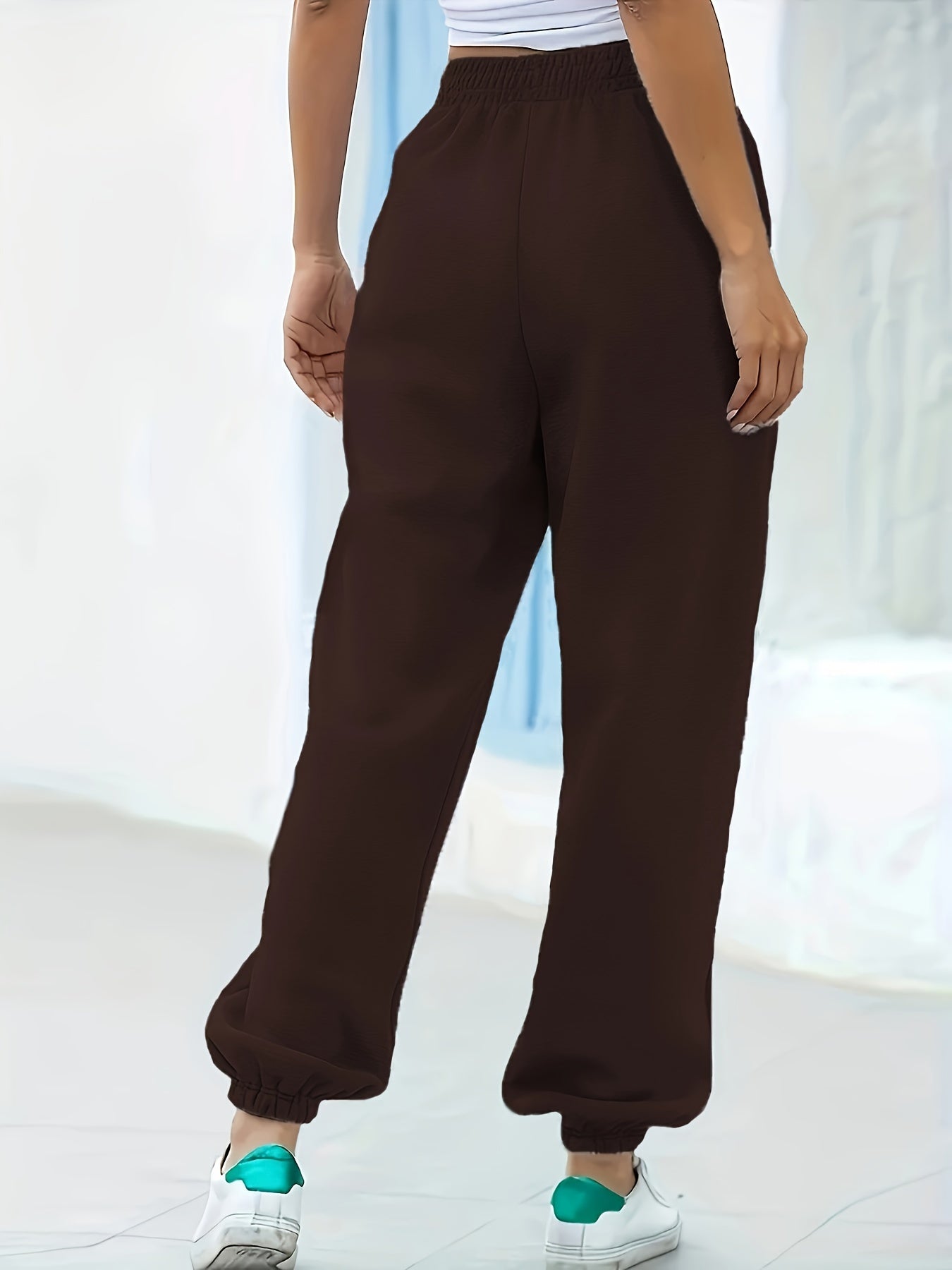 Joggingbroek met hoge taille, rechte pijp en zijzakken